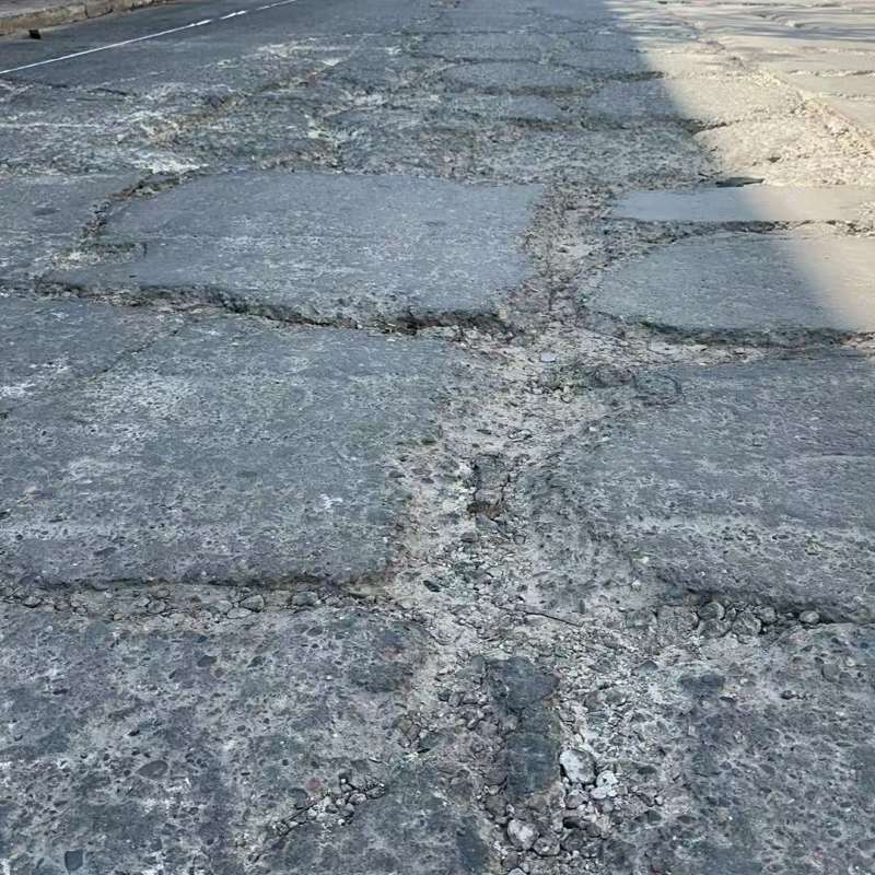 沈河路面起砂露石子修补料